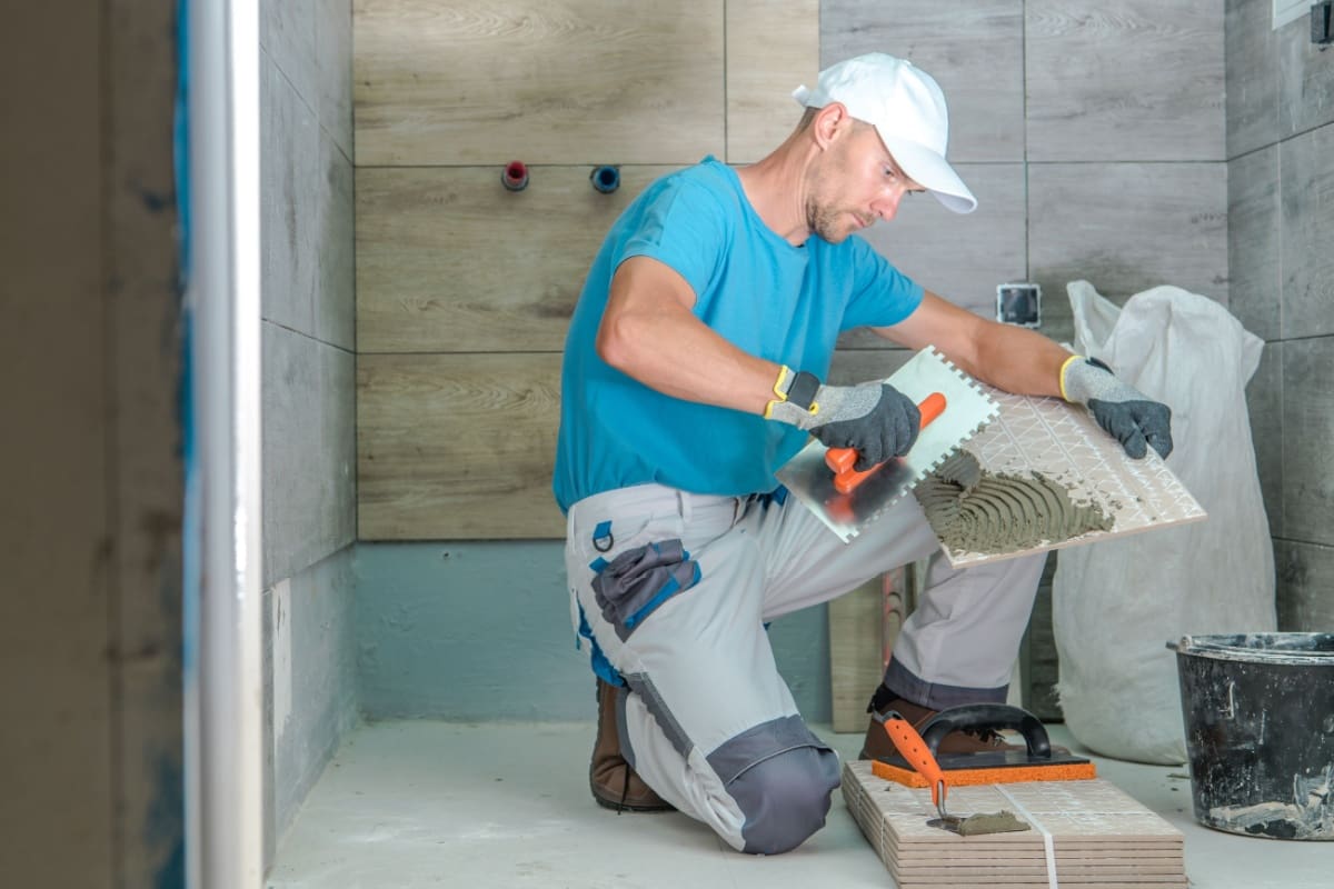 Contractor remodeling a bathroom